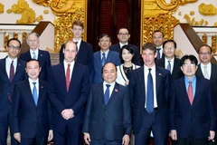 Thủ tướng Nguyễn Xuân Phúc với các đại biểu. (Ảnh: Thống Nhất-TTXVN)