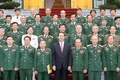 Chủ tịch nước Trần Đại Quang với các đại biểu tại buổi gặp mặt. (Ảnh: Nhan Sáng/TTXVN)