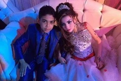 Chú rể và cô dâu vẫn ở độ tuổi trẻ con. (Nguồn: Washington Post)