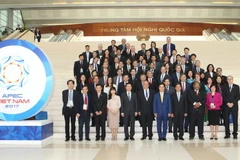 Phó Thủ tướng, Bộ trưởng Ngoại giao Phạm Bình Minh và các đại biểu dự Phiên khai mạc. (Ảnh: Doãn Tấn/TTXVN)