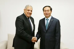 Chủ tịch nước Trần Đại Quang tiếp Trưởng đoàn Ai Cập Ibrahim Mahlab. (Ảnh: Nhan Sáng/TTXVN)