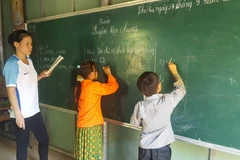 Một tiết học của học sinh phân trường Phia Cò. (Ảnh: Quân Trang/TTXVN)