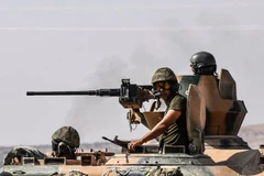 Xe tăng quân đội Thổ Nhĩ Kỳ tiến vào lãnh thổ Syria. (Nguồn: AFP)