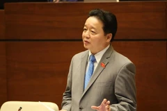 Bộ trưởng Bộ Tài nguyên và Môi trường Trần Hồng Hà trả lời chất vấn của Đại biểu Quốc hội. (Ảnh: Phương Hoa/TTXVN)