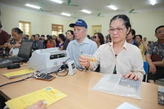 Chi trả lương hưu. (Ảnh: PV/Vietnam+)