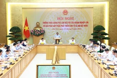 Thủ tướng Phạm Minh Chính chủ trì Hội nghị Thường trực Chính phủ làm việc với các doanh nghiệp lớn về giải pháp góp phần phát triển kinh tế-xã hội đất nước. (Ảnh: Dương Giang/TTXVN)