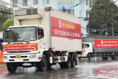 An Giang chuyển 65 tấn hàng cứu trợ 2 tỉnh Yên Bái và Lào Cai bị thiệt hại nặng do bão số 3. (Ảnh: Thanh Sang/TTXVN)