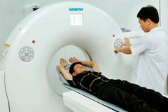 Người dân được thụ hưởng dịch vụ y tế chất lượng cao từ y tế cơ sở tại Trung tâm Y tế Yên Lạc. (Ảnh: Dương Ngọc/TTXVN)