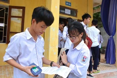 Đẩy mạnh công tác bảo hiểm y tế cho học sinh. (Ảnh: TTXVN)