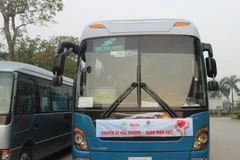[Photo] 22 chuyến xe yêu thương đưa người bệnh về quê đón Tết 