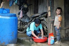 Nâng cao chất lượng dân số được xác định là nhiệm vụ trọng tâm trong giai đoạn hiện nay. (Ảnh: TTXVN)