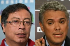 Ứng cử viên theo đường lối bảo thủ Ivan Duque và ứng cử viên cánh tả Gustavo Petro. (Ảnh: AFP/TTXVN)