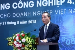 Thứ trưởng Bộ Công thương Cao Quốc Hưng phát biểu tại hội thảo. (Ảnh: Anh Tuấn/TTXVN)