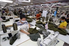 May hàng xuất khẩu. (Ảnh: Trần Việt/TTXVN)