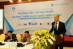 Ông Vũ Bá Phú, Cục trưởng Cục Xúc tiến Thương mại thuộc Bộ Công Thương phát biểu tại diễn đàn. (Ảnh: Trần Việt/TTXVN)