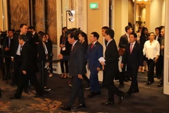 Phó Thủ tướng, Bộ trưởng Ngoại giao Phạm Bình Minh cùng các đại biểu dự Hội nghị. (Ảnh: Xuân Vịnh/TTXVN)