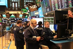 Giao dịch viên tại Sàn giao dịch chứng khoán New York của Mỹ. (Ảnh: THX/TTXVN)