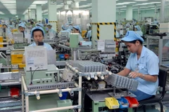 Dây chuyền sản xuất motor điện loại nhỏ. (Ảnh: Danh Lam/TTXVN)