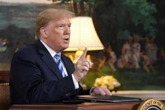 Tổng thống Mỹ Donald Trump phát biểu với báo giới sau khi ký sắc lệnh trừng phạt Iran, tại Nhà Trắng ngày 8/5/2018. (Nguồn: AFP/TTXVN)