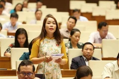 Đại biểu Quốc hội tỉnh Yên Bái Triệu Thị Huyền phát biểu. (Ảnh: Phương Hoa/TTXVN)