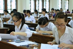 [Photo] Thí sinh chính thức bước vào môn thi Đại học đầu tiên