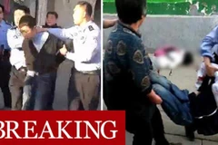 Bắt giữ nghi phạm vụ tấn công bằng dao ở Mễ Chi. (Nguồn: Daily Mail/TTXVN)