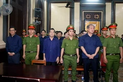 Các bị cáo tại phiên tòa. (Ảnh: Hoàng Hải/TTXVN)