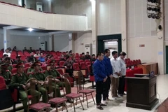 Các bị cáo tại phiên tòa. (Ảnh: Hữu Quyết/TTXVN)