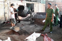 Chế biến càphê bẩn tại cơ sở của bà Nguyễn Thị Thanh Loan. (Nguồn: TTXVN)