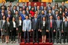 Chủ tịch nước Trần Đại Quang với các đại biểu tham dự buổi gặp mặt. (Ảnh: Nhan Sáng/TTXVN)