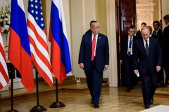 Tổng thống Mỹ Donald Trump (trái) và Tổng thống Nga Vladimir Putin trong cuộc họp báo chung sau hội nghị thượng đỉnh ở Helsinki, Phần Lan ngày 16/7. (Nguồn: AFP/TTXVN)