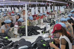 Dây chuyền may xuất khẩu. (Ảnh: Quốc Việt/TTXVN)