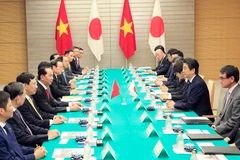 Chủ tịch nước Trần Đại Quang hội đàm với Thủ tướng Nhật Bản Shinzo Abe. (Ảnh: Nhan Sáng/TTXVN)