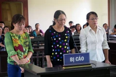 Các bị cáo nghe tuyên án. (Ảnh: Thế Lập/TTXVN)