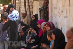 Người dân Syria. (Nguồn: AFP/TTXVN)