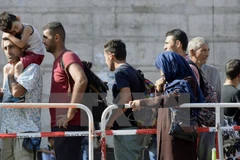 Người di cư tại nhà ga ở Munich, miền Nam nước Đức. (Nguồn: AFP/TTXVN)