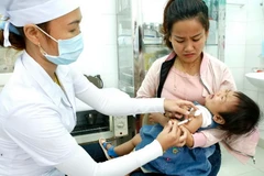 Tiêm vắcxin cho trẻ. (Nguồn: TTXVN)