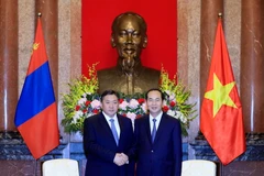 Chủ tịch nước Trần Đại Quang tiếp Chủ tịch Quốc hội Mông Cổ Miyegombo Enkhbold đang thăm chính thức Việt Nam. (Ảnh: Nhan Sáng/TTXVN)