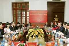 Bí thư Trung ương Đảng, Chánh án Tòa án Nhân dân Tối cao Nguyễn Hòa Bình hội đàm với Chánh án Tòa án Nhân dân Tối cao Trung Quốc Chu Cường. (Ảnh: Nguyễn Dân/TTXVN)