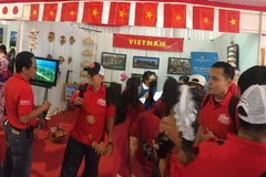 Gian trưng bày, giới thiệu các chính sách xuất nhập cảnh và quảng bá du lịch Việt Nam tại Ngày hội. (Ảnh: Đỗ Quyên/TTXVN)