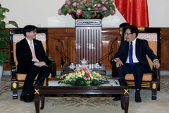 Phó Thủ tướng Phạm Bình Minh tiếp ông Manopchai Vongphakdi, Đại sứ Thái Lan tại Việt Nam. (Ảnh: Phạm Kiên/TTXVN) 