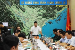 Quang cảnh buổi họp của Ban Chỉ đạo Quốc gia về Phòng, Chống Thiên tai triển khai ứng phó với bão số 5. (Ảnh: Vũ Sinh/TTXVN)