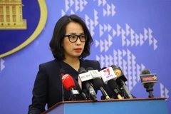 Người phát ngôn Bộ Ngoại giao Phạm Thu Hằng trả lời câu hỏi của phóng viên trong nước và quốc tế. (Ảnh: Văn Điệp/TTXVN)