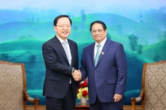 Thủ tướng Phạm Minh Chính tiếp ông Park Hark Kyu, Tổng Giám đốc Phụ trách Tài chính Tập đoàn Samsung. (Ảnh: Dương Giang/TTXVN)