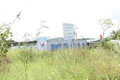 Tòa nhà điều hành dự án Khu đô thị Sing Việt tại huyện Bình Chánh. (Ảnh: Trần Xuân Tình/TTXVN)