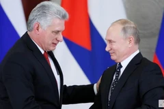 Tổng thống Nga Vladimir Putin và Chủ tịch Hội đồng nhà nước và Hội đồng bộ trưởng Cuba Miguel Diaz-Canel. (Nguồn: Reuters)