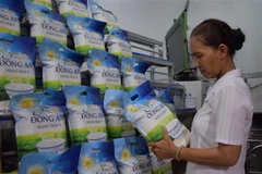 Gạo an toàn mang nhãn hiệu "Gạo Đồng An.". (Ảnh: Chương Đài/TTXVN)