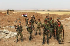 Quân đội Syria được triển khai tại khu vực biên giới với Thổ Nhĩ Kỳ ở ngoại ô thành phố Qamishli, tỉnh al-Hasakah, ngày 28/10/2019. (Ảnh: THX/TTXVN)