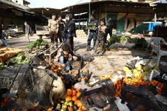 Hiện trường vụ đánh bom xe nhằm vào một khu chợ ở Syria. (Ảnh minh hoạ. AFP/TTXVN) 