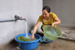 Người dân sử dụng nguồn nước sạch phục vụ sinh hoạt hàng ngày. (Ảnh minh họa. Việt Dũng/TTXVN)